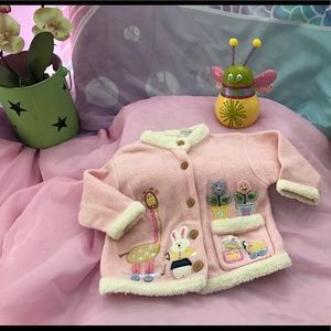 Gently used Easter inspired soft baby sweater